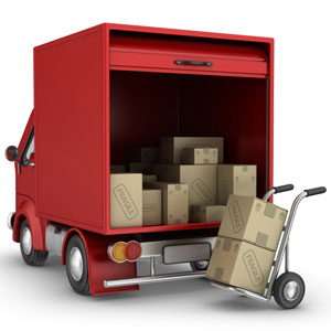 a red delivery van with a hand truck and cardboard boxes